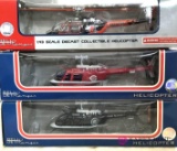 Fleer collectible sport helicopter and a white rose sport helicopters
