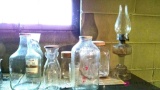 Lot of vintage bottles and oil lamp