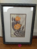 Framed artwork with signature