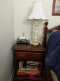 Nightstand, lamp, clock, contents