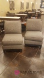 Two gray plush chairs