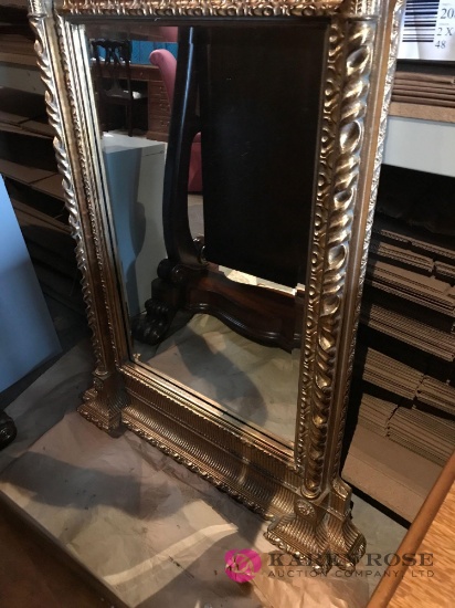Decorative gold framed mirror