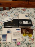1996 Cadillac owners manuals and video. Pair of sunglasses