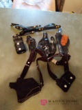 4 holsters and 2 belt holsters