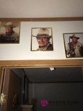 Three framed John Wayne