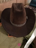 Three John Wayne type hats