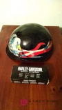 Harley-Davidson safety eyewear and a motorcycle helmet