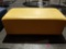 Yellow cushioned seat