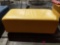 Yellow cushioned seat