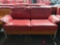 Red cushioned couch