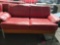 Red cushioned couch