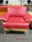 Red cushioned armchair