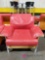 Red cushioned armchair