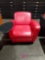 Red armchair with attached table