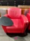 Red armchair with attached table