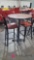 Tall cafe table with two chairs