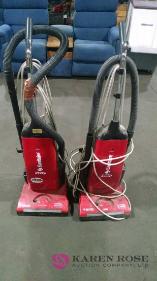Two sanitaire dual clean commercial vacuums
