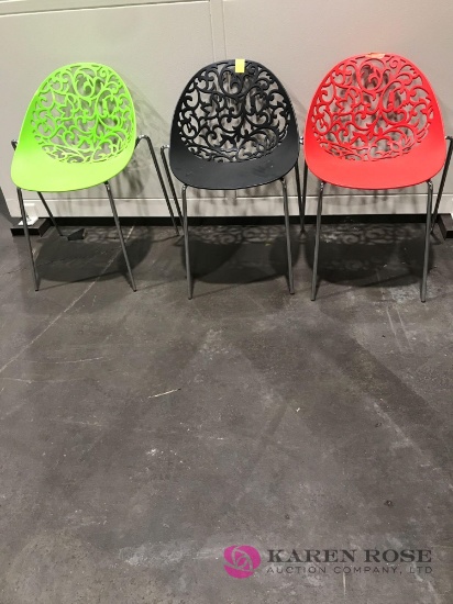Lot of three metal and plastic outside chairs