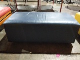 Blue cushioned bench seat