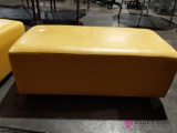 Yellow cushioned seat