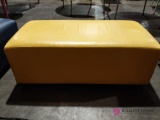 Yellow cushioned seat