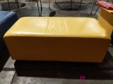 Yellow cushioned seat