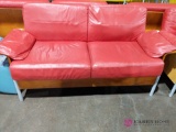 Red cushioned couch