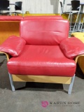 Red cushioned armchair