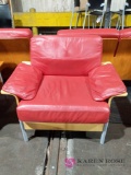 Red cushioned armchair