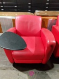 Red armchair with attached table