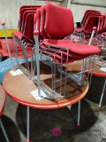 2 round tables and 8 chairs