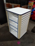 Wooden shelving unit on wheels