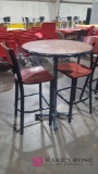 Tall cafe table with two chairs