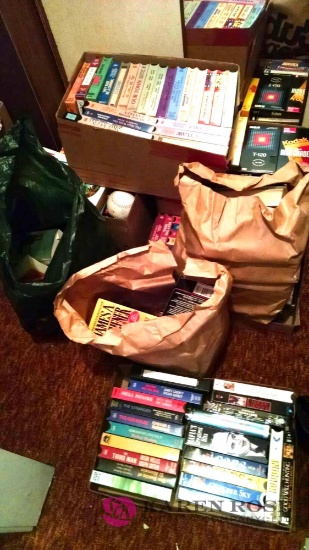 Large lot of VHS tapes and books