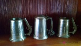 Two pewter mugs and one pewter stein