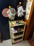 Wooden Shelving Unit with Assorted Magnets and Oven Mitts
