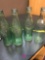 Three glass Coke bottles/moxie bottle