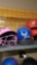 Four baseball helmets