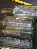 4 Vintage medicine bottles