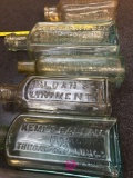 Six vintage medicine bottles