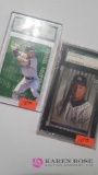 Two Derek Jeter baseball cards
