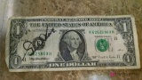 Autographed $1 bill