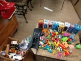 Large lot of assorted toys and Disney glasses see pictures