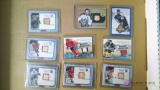 Game-used hockey stick cards and Joe Louis Arena boards