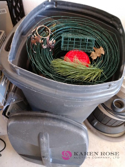 Trash can with contents of fencing