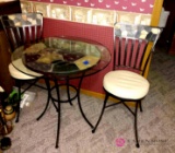 Glass top cafe table with two chairs