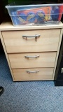 Three drawer cabinet with wheels