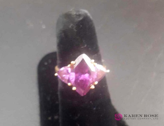 10 karat gold ring with purple stones
