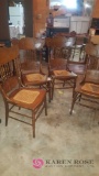 Set of four cane chairs