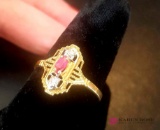 10 karat gold ring with red stone